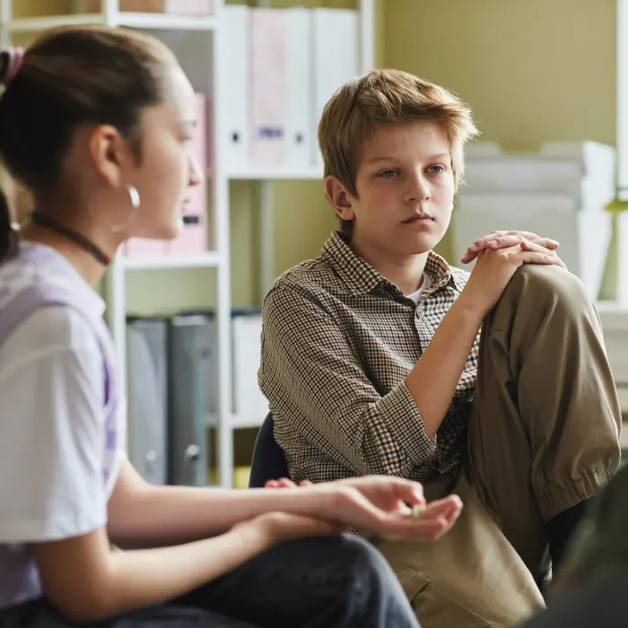 A young person in a calm therapy session