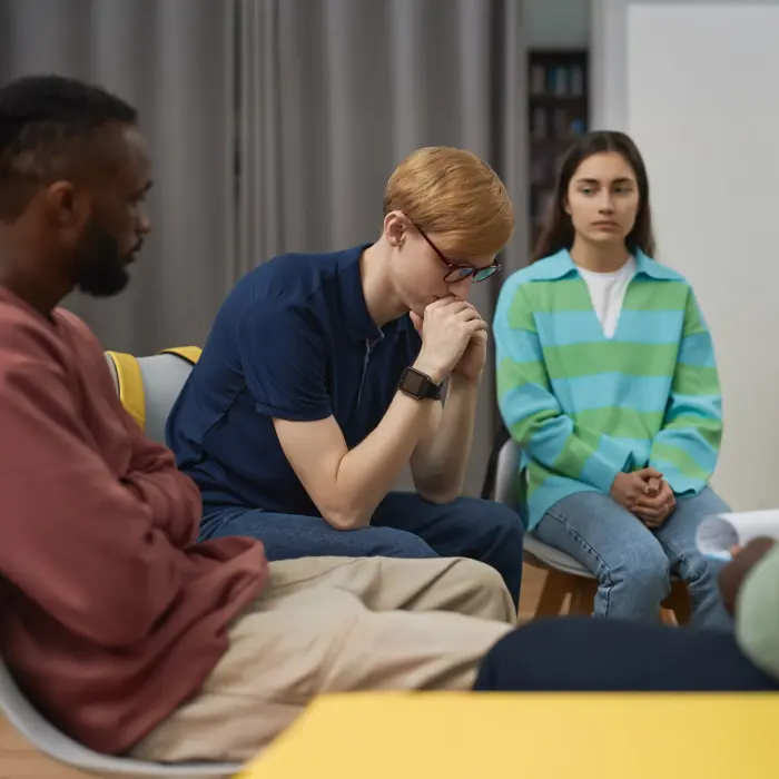 Two young people in a supportive counseling session
